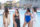 Group of friends hanging out by the pool