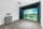 Entertainment area with a screen and balls.